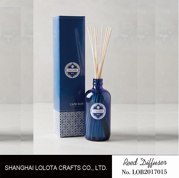 Wholesale transparent blue color reed diffuser with natural stick and pattern folding box from china suppliers