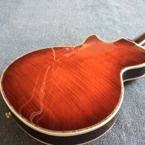 A new style of custom guitar, double F holes,Gold hardware,Flame Maple Top &