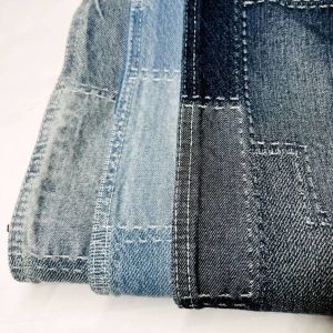 China Cotton Blend Stitching Lattice Jacquard Denim Fabric Jean Material Fabric For Garments on sale