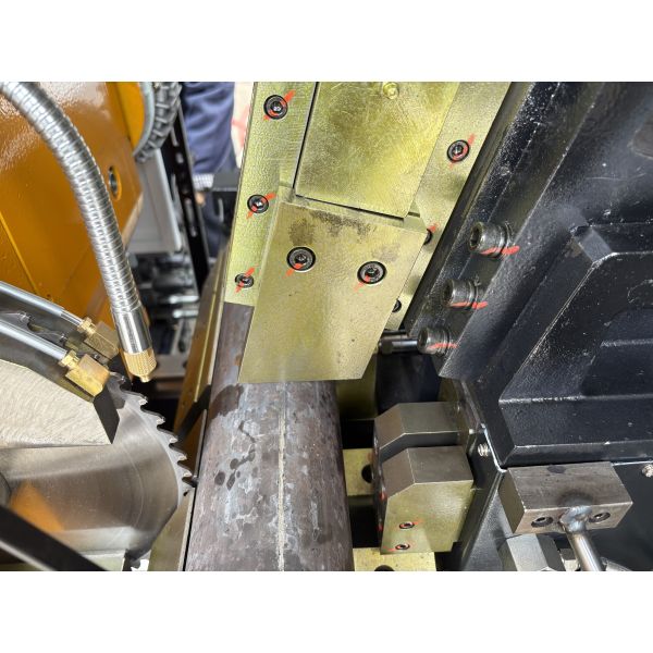 JSSCD-100NC CNC Circular Saw Cutting Machine side view displaying material handling system