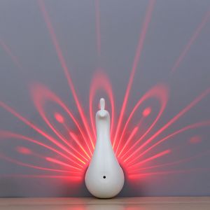 Novelty gifts product Peacock projection lamp, funny and attractive attractive