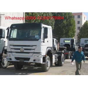 China SINOTRUK HOWO ZZ4257S3241W 6x4 Right hand drive 371HP tractor truck on sale