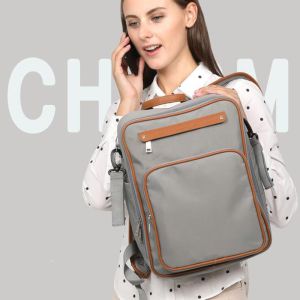China Multifunctional Baby Bag Waterproof Travel Backpack Business Shell Mummy Diaper Bag With Stroller Strap For Mom&Dad on sale