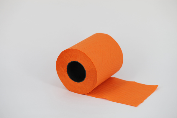 Solid orange toilet tissue roll