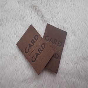 Embossed Leather Woven Label With Dashed Points Convenient To Mid Fold