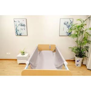 Intelligent suspended nursing bed suitable for elderly and disabled people's