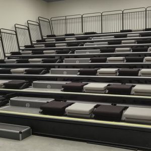 PP Material Retractable Bleacher Seating with Sofa Cushion and Rear Folding Design for Studio Meeting Room