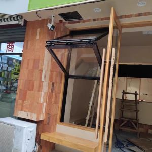 Balcony-Integrated Folding Window Enabling Container Gardening Access and Micro