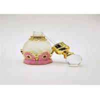 China Custom Dubai Arabian Colorful Perfume Bottles Wind Metal Oil Pink Color for sale