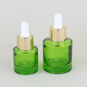 China Eco Friendly Cosmetic Packaging 15ml30ml 50ml 1 oz 1.5oz Green Serum Essential Oil Bottomed Glass Dropper Bottle with Golden Cap on sale