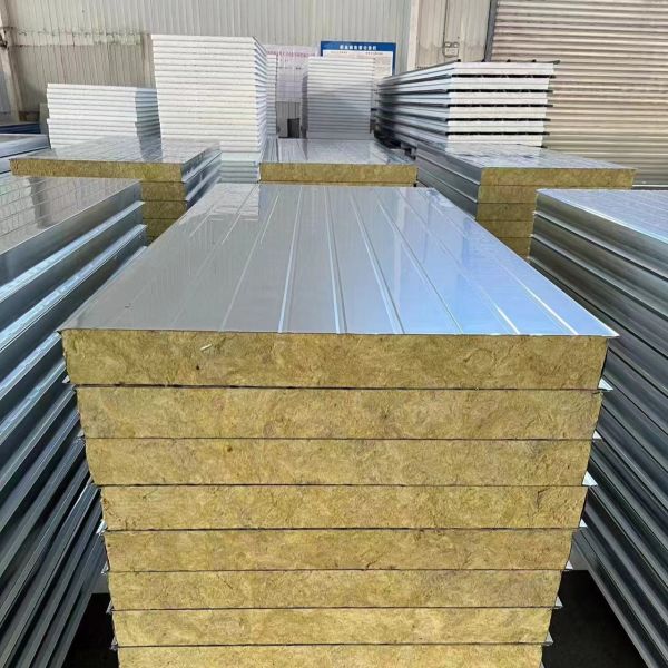 EPS Rock Wool Sandwich Roof Sheet Panel Roll Forming Machine in operation
