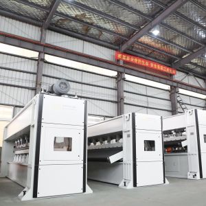 High capacity automated computer control needle punch geotextile nonwoven