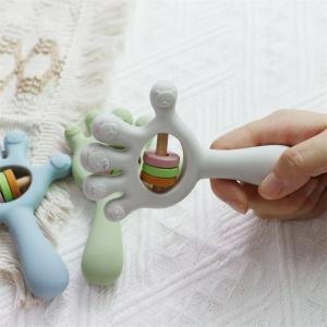 China Soft Baby Silicone Teething Rattle Palm hand shape Toys: BPA-Free, Non-Toxic, Chewable on sale