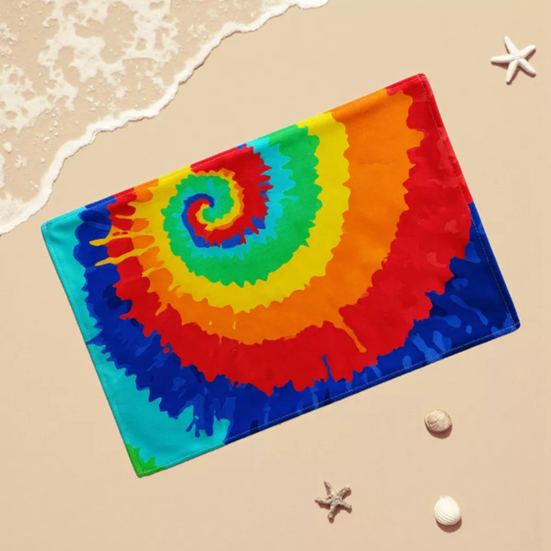 Colorful tie-dye beach towel made with quick-dry microfiber and sand-free smooth