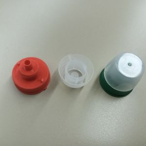 Laundry Detergent Cap Assembly Machine For Simultaneous Assembly Of Two Sizes Of