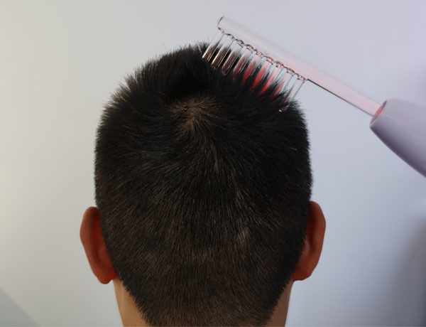 High-frequency electrotherapy comb attachment