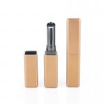 China 2.5g Clear Lip Balm Containers Luxurious Brown Metallic Exterior Antique Lipstick Tube for sale