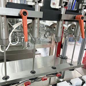 Custom Four Nozzle Cream Filling Machine Liquid Cycle Filling Line