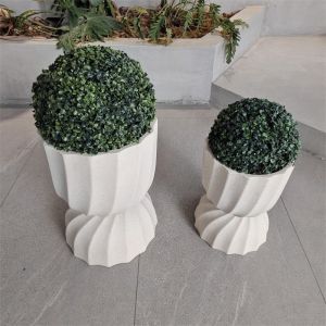 Wholesale Round Fiber Clay Planter In Modern Style With Textured Surface And Weather-Resistant Material from china suppliers