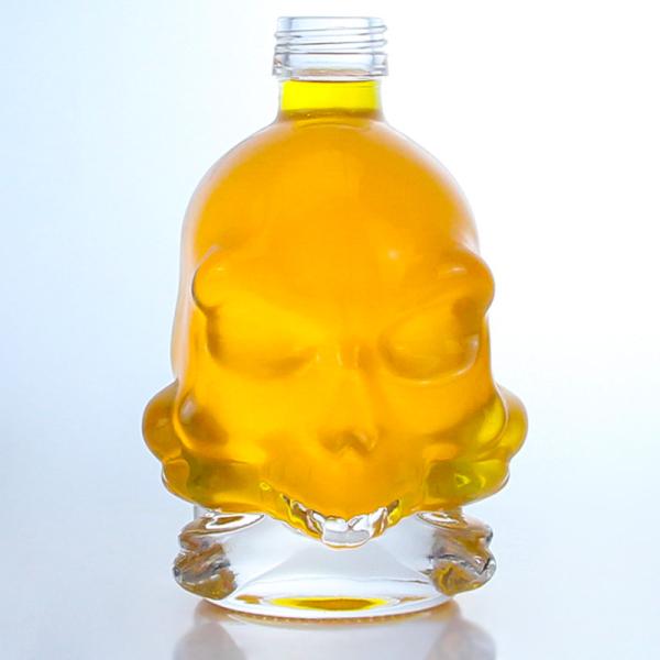 Decal Surface Skull Shape Glass Liquor Bottle for Whisky Vodka Brandy Aging Technique