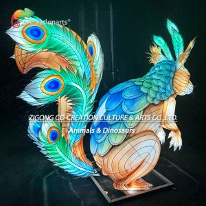 Giant Illuminated Squirrel Sculpture Lantern With Dazzling Peacock Feather Tail