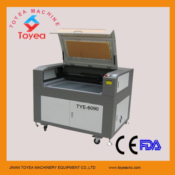 Quality MDF laser engraving machine with Red pot position TYE-6090 for sale