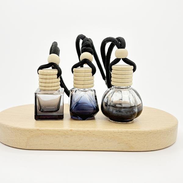 Quality Square Triangle Black Glass Screw Sealed Car Perfume Bottle with Rubber Stopper Hanging Diffuser for sale