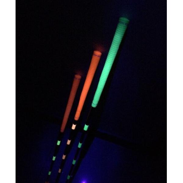 mini fluorescent golf putter in black light (glow in uv light ), mini golf putter