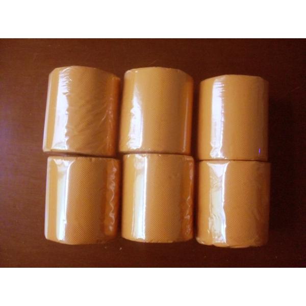 Solid yellow toilet tissue roll