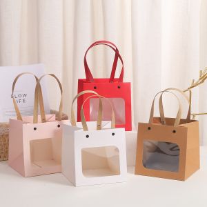 China Creative Kraft Paper Bag Smiley Face Flowers White Card Handbag Baking Cake Dried Fruit Snack Packaging Bag on sale