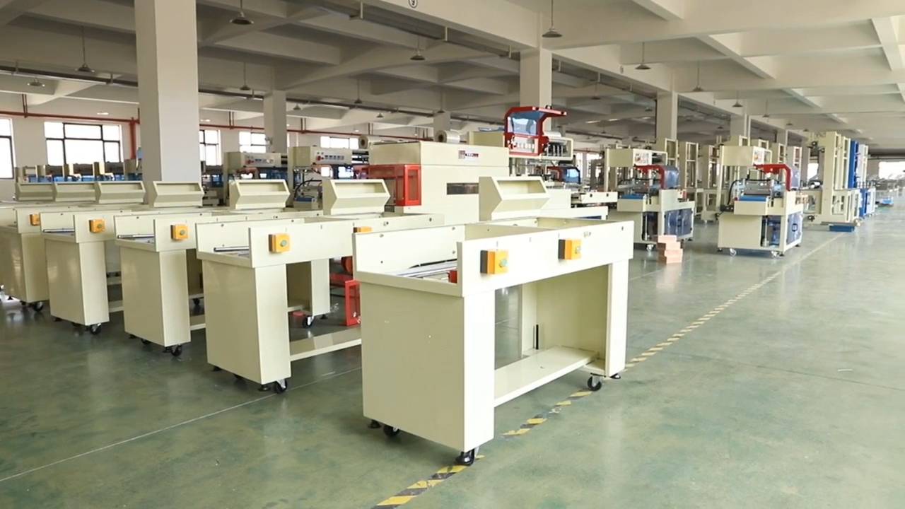 High Quality New Design Auto Strapping Low Table pp Belt Strapping Machine for Packaging Machinery