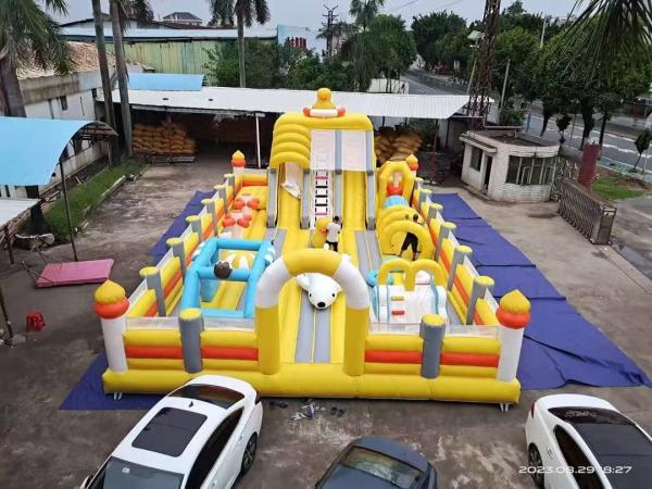 Quality Yellow Duck With Big Slides And Bouncy Jumping Inflatable Castle for sale