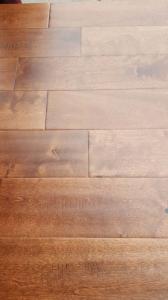 China distressed birch solid hardwood flooring with handscraped & charter Mark texture on sale